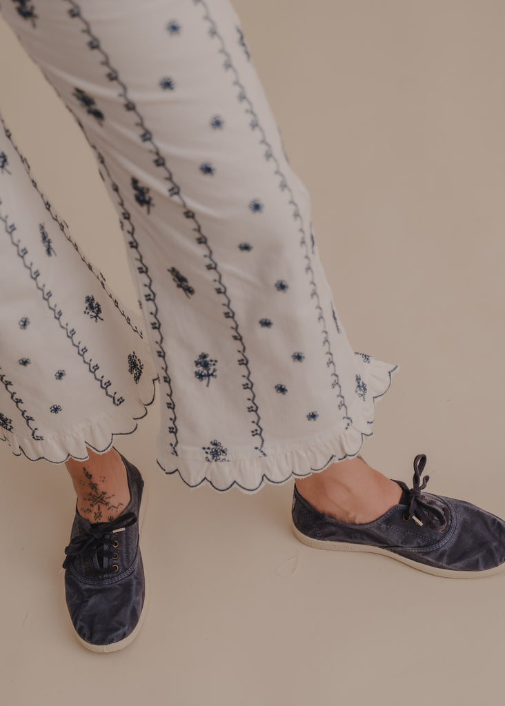 Old Arum Sneakers — Blue sneakers and white embroidered pants on model — MYFASHIONFRUIT
