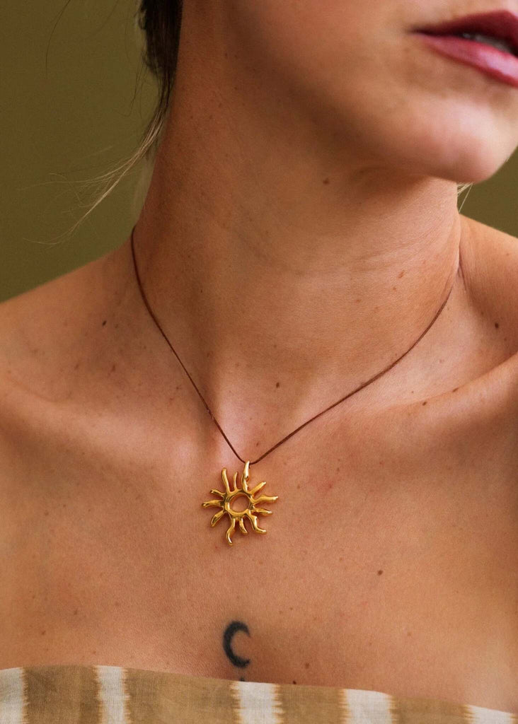 Sandya Pendant — Gold sun necklace on model — MYFASHIONFRUIT