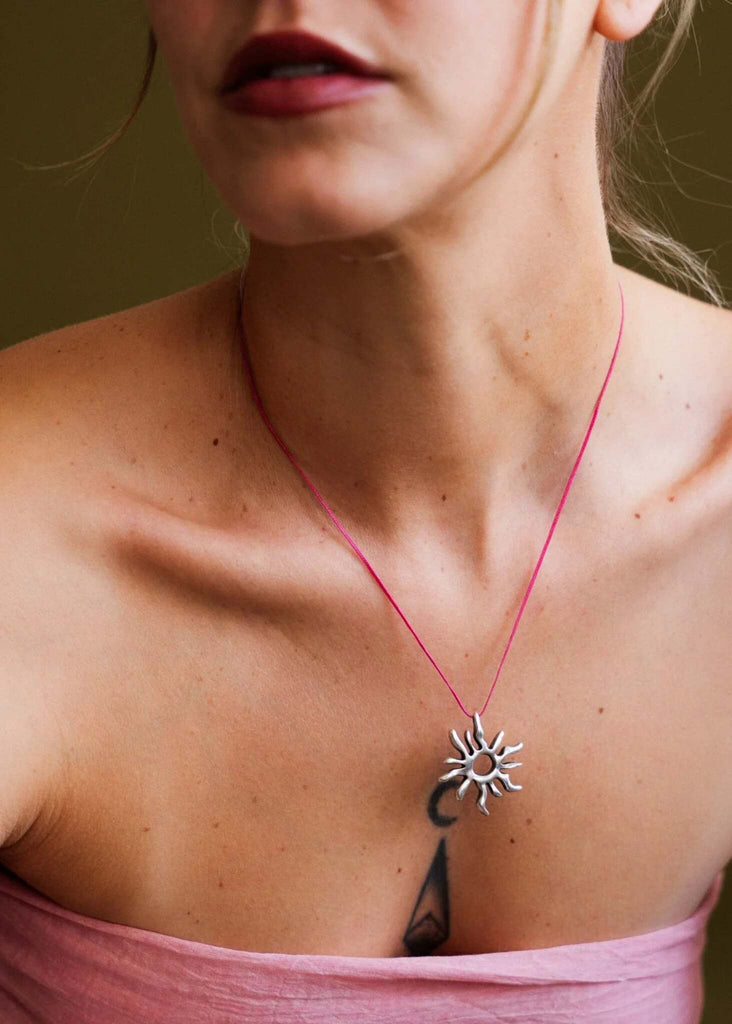 Sandya Pendant — Silver sun pendant on model — MYFASHIONFRUIT
