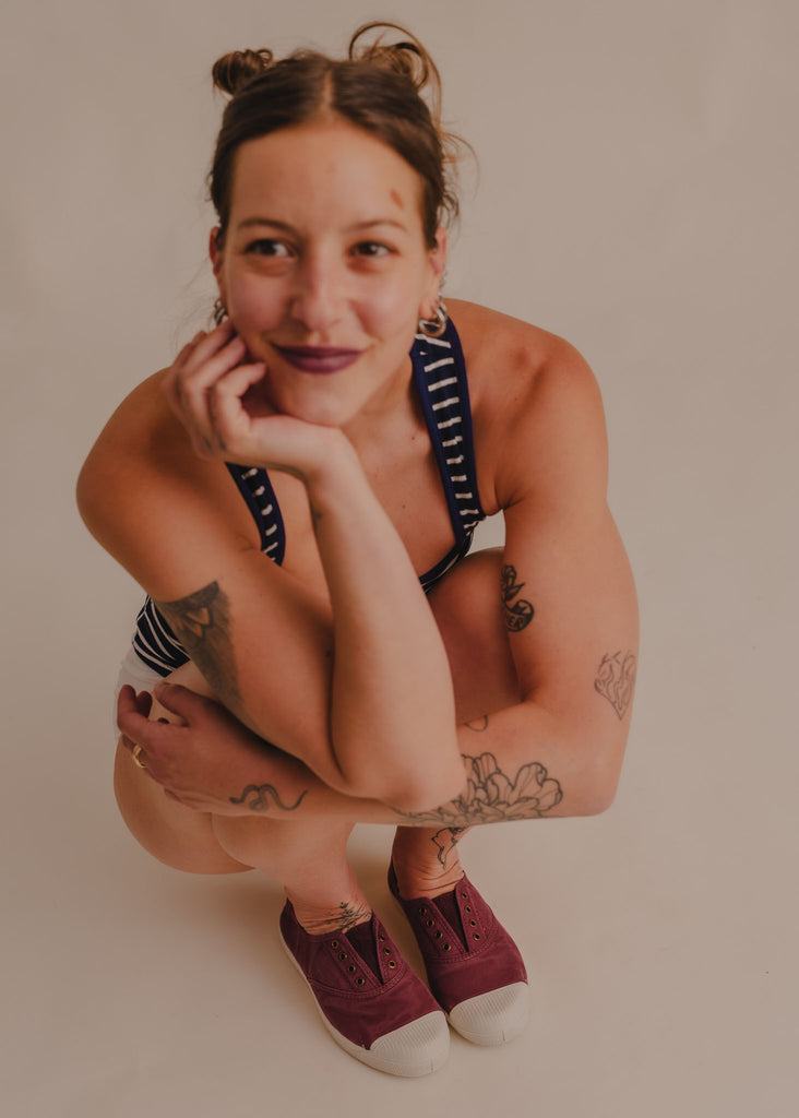 Old Lavanda Sneakers — Burgundy sneakers with white toe caps on model — MYFASHIONFRUIT