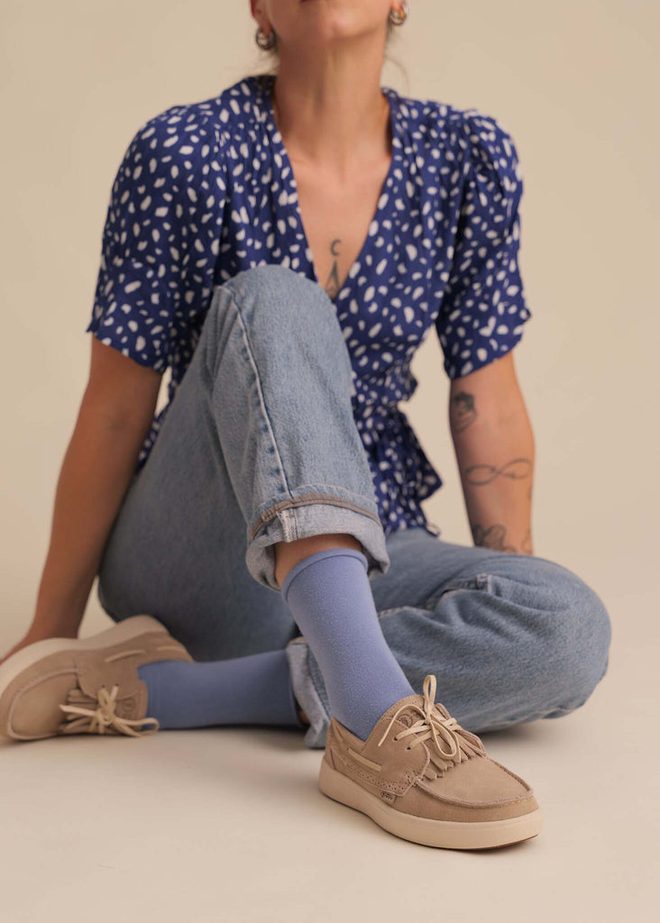 Figuera Boat Shoes — Beige boat shoes on model with blue top & jeans on model — MYFASHIONFRUIT