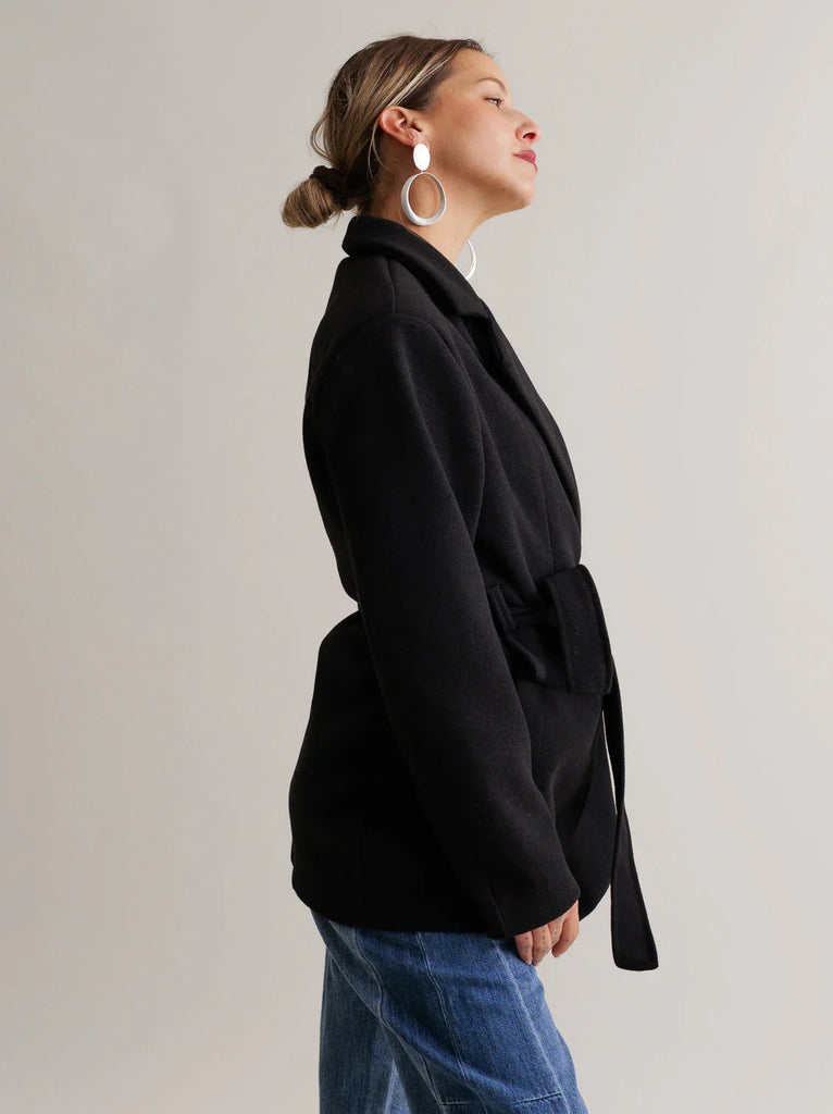 Lorenza Coat — Black wool coat with tie belt on model — MYFASHIONFRUIT