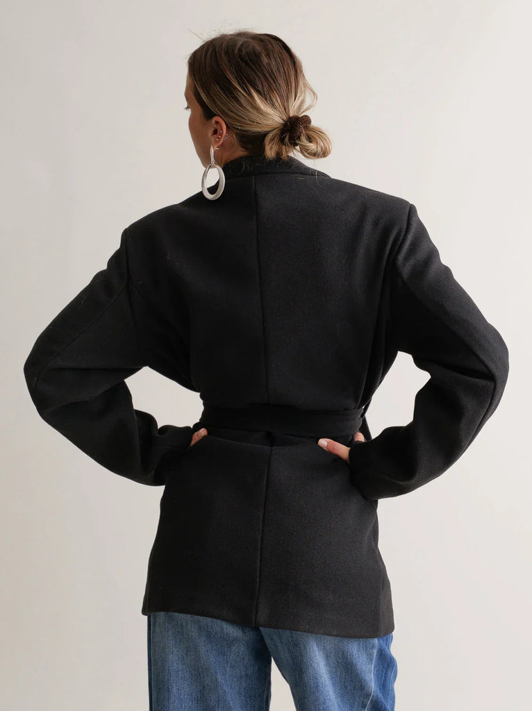 Lorenza Coat — Black belted coat on model, rear view — MYFASHIONFRUIT
