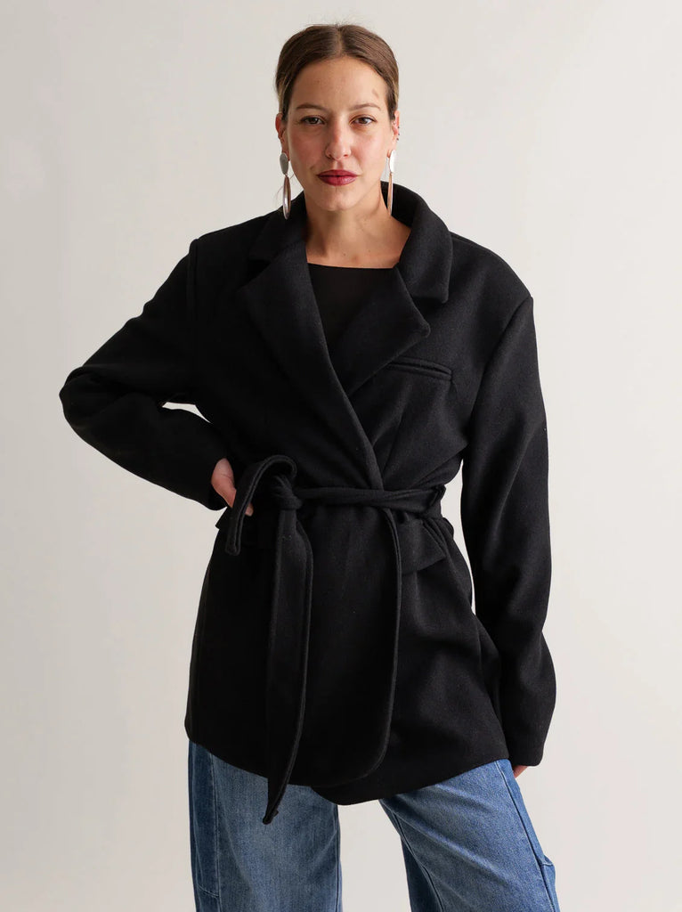 Lorenza Coat — Black wool coat with tie belt on model — MYFASHIONFRUIT