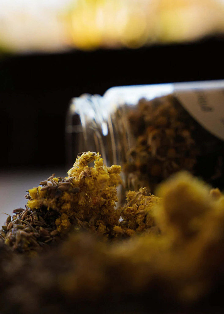 Nani Baby Bath — Dried herbs spilling from jar, detail — MYFASHIONFRUIT