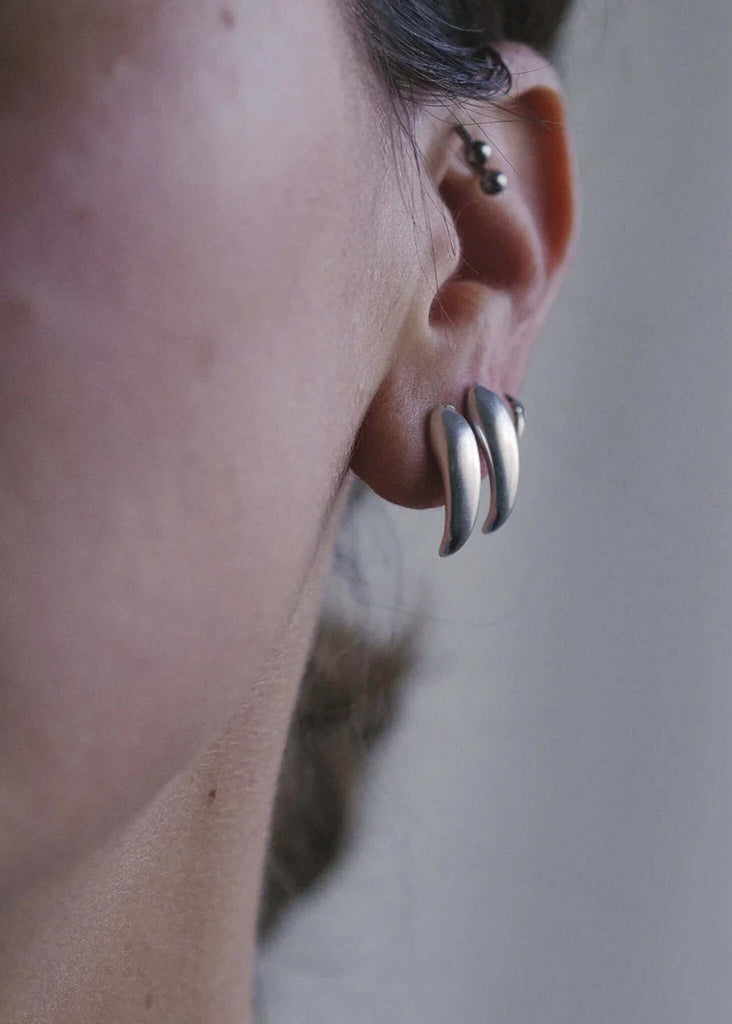 Hug Earrings — Silver earrings on model, detail — MYFASHIONFRUIT