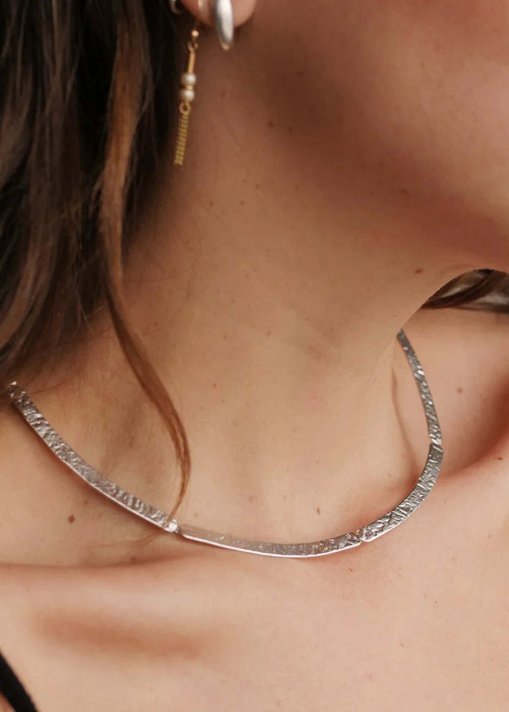 Mensa Collar — Silver hammered collar necklace on model — MYFASHIONFRUIT