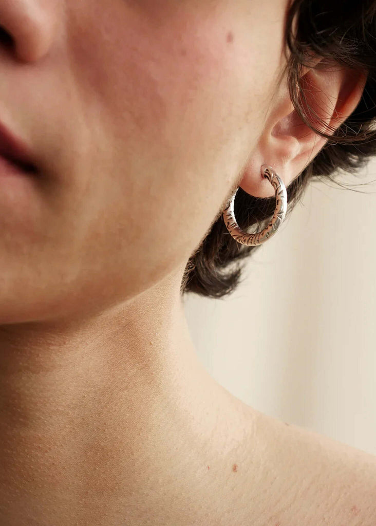 Flo Hoops — Silver hoop earrings on model, detail — MYFASHIONFRUIT