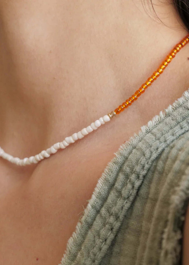 Gabby Necklace — White and orange beaded necklace on model — MYFASHIONFRUIT