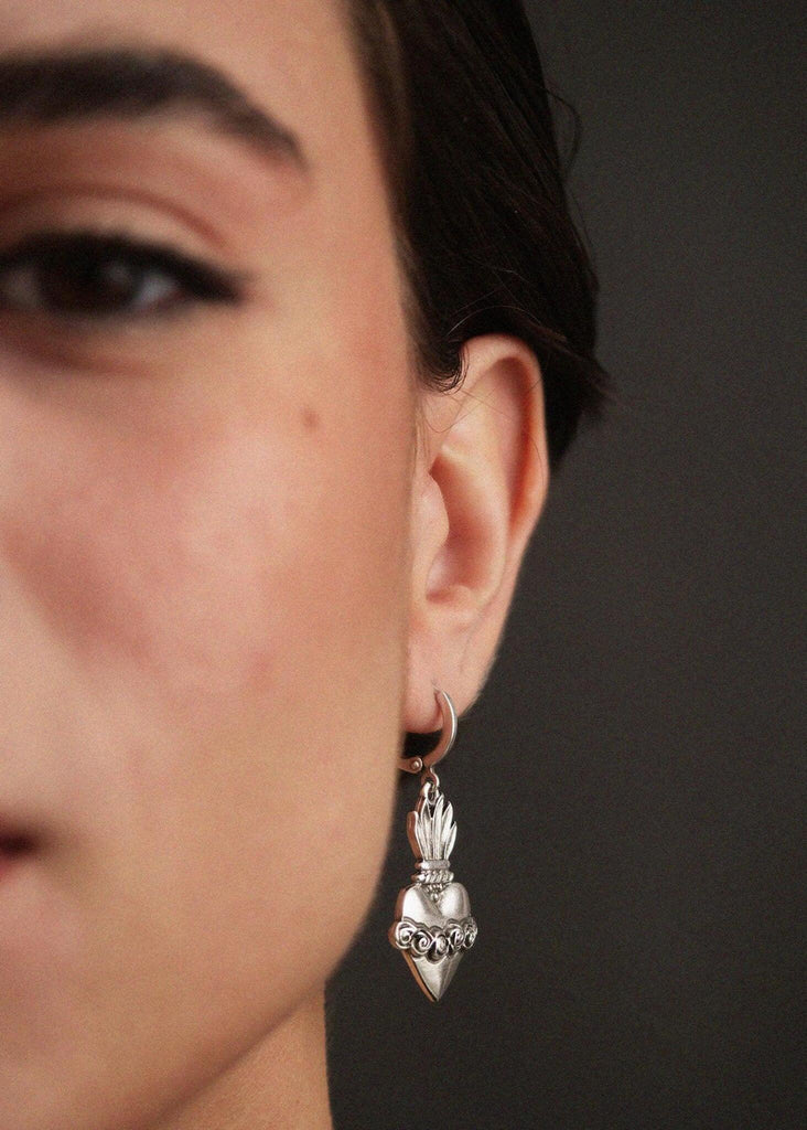 Corazon Earrings — Silver heart earring on model, detail — MYFASHIONFRUIT