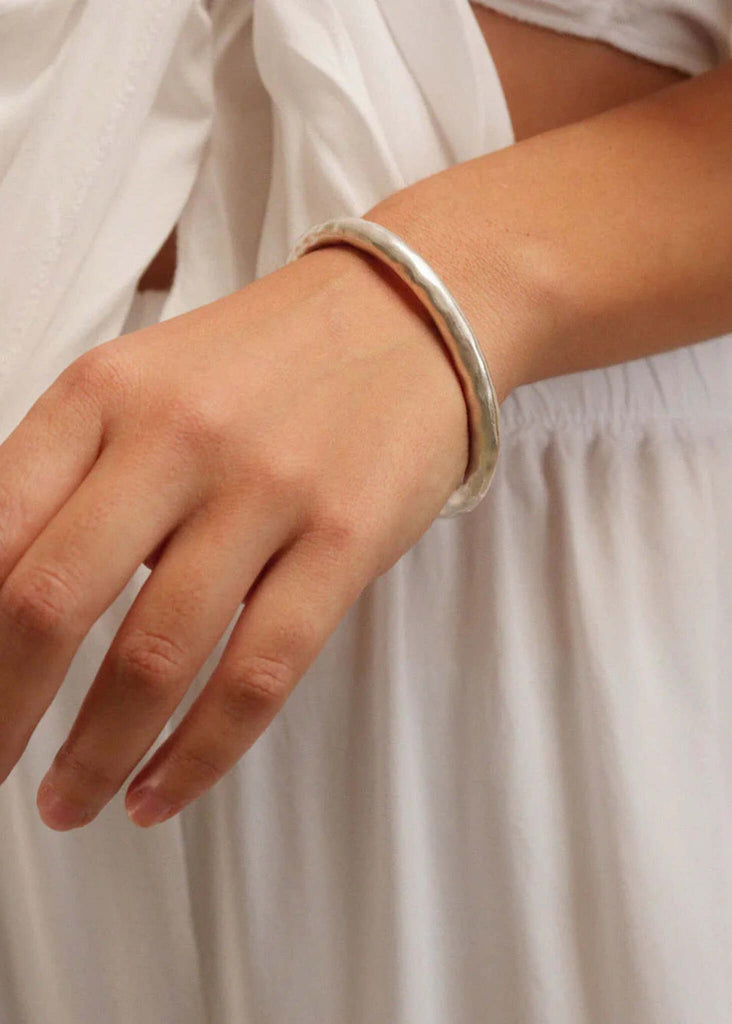 Cylindrical Cuff — Silver bangle detail on wrist — MYFASHIONFRUIT