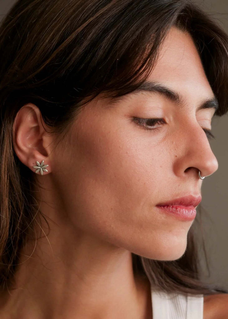 Anthea Earrings — Silver flower earrings on model, detail — MYFASHIONFRUIT