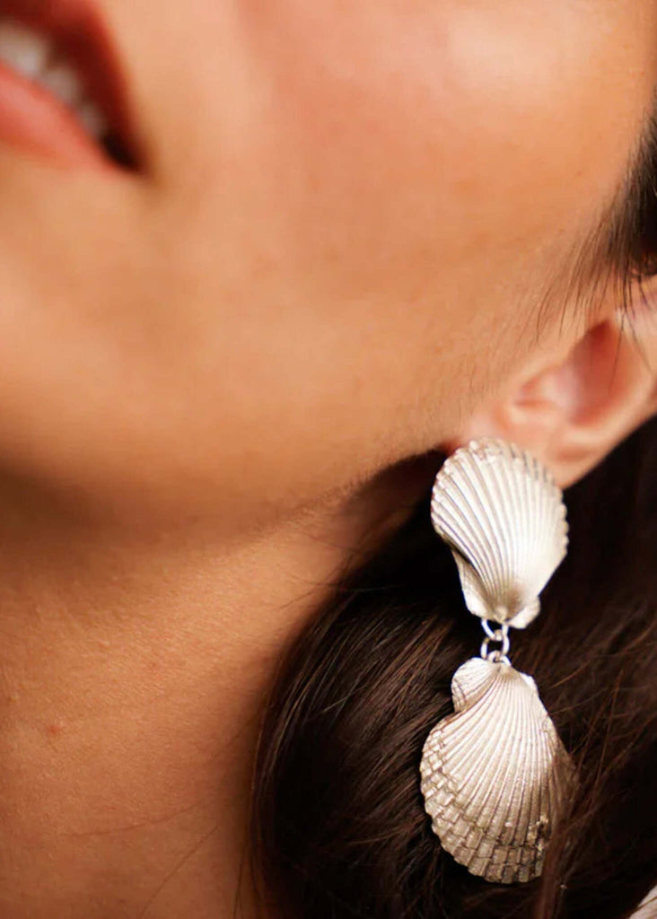 Amphitrite Earrings — Silver seashell earrings on model — MYFASHIONFRUIT