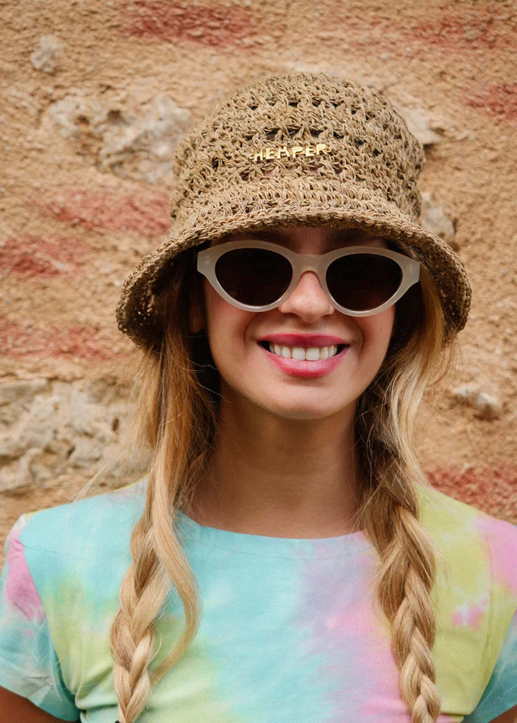 Woman wearing Komono KIKI Milk Havana Sunglasses and raffia hat — MYFASHIONFRUIT