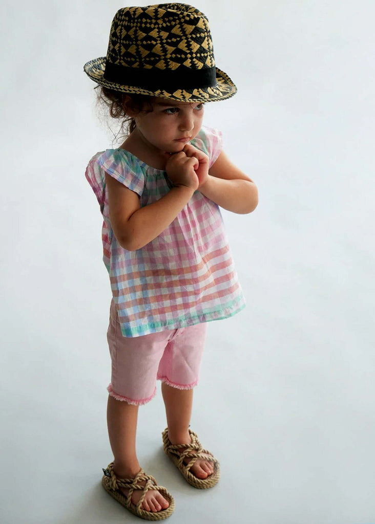 Child wearing a plaid top, pink shorts and JC Kids Camel Sandals — MYFASHIONFRUIT