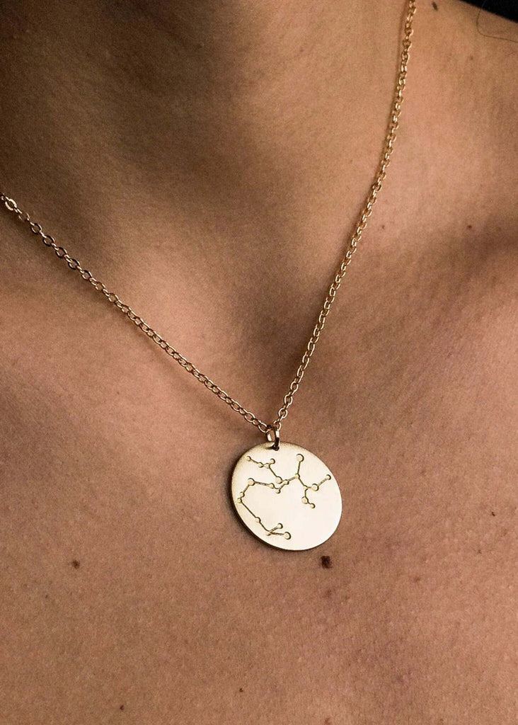 Zodiac Constellation Necklace — gold pendant on skin — MYFASHIONFRUIT