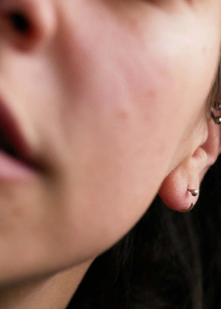 Petits Silver Hoops — detail, woman wearing silver hoops, helix and lobe piercing — MYFASHIONFRUIT