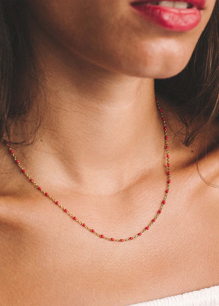 Dakota Necklace — gold chain with red enamel beads detail on model — MYFASHIONFRUIT