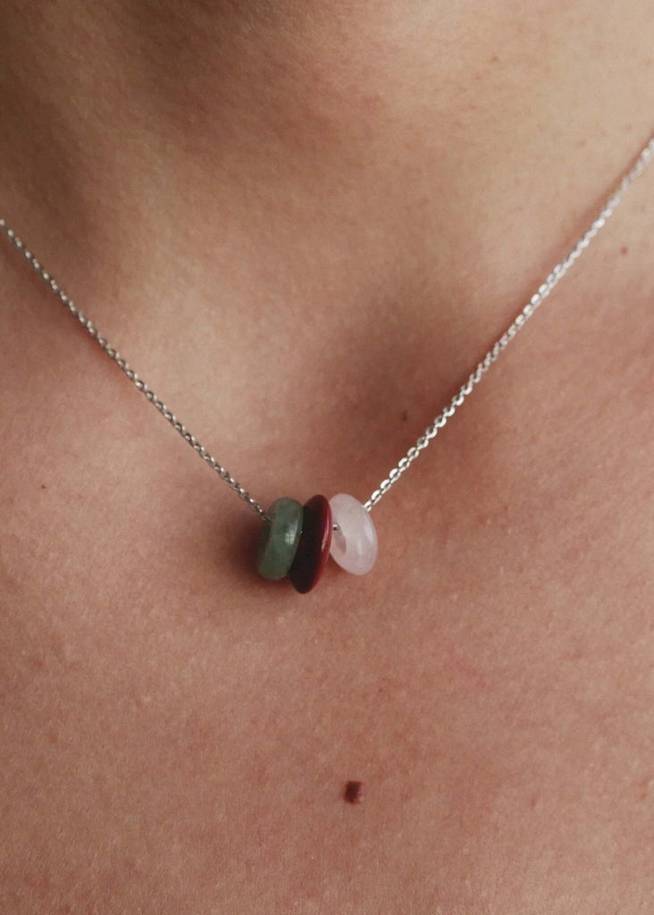 Love Creation & Heal Pendant — Silver chain with gemstone detail on model — MYFASHIONFRUIT