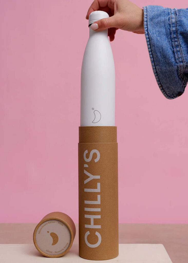 Chilly's All White Bottle — Hand on lid, in branded cardboard tube — MYFASHIONFRUIT