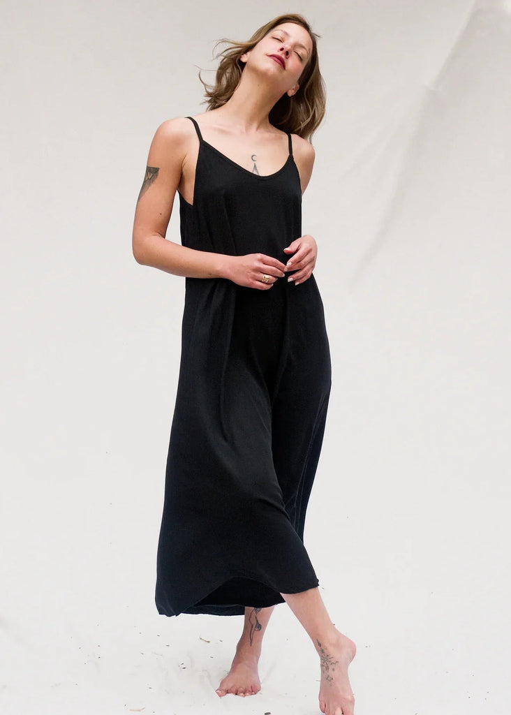 Granadas Dress — Black midi dress with thin straps on model — MYFASHIONFRUIT