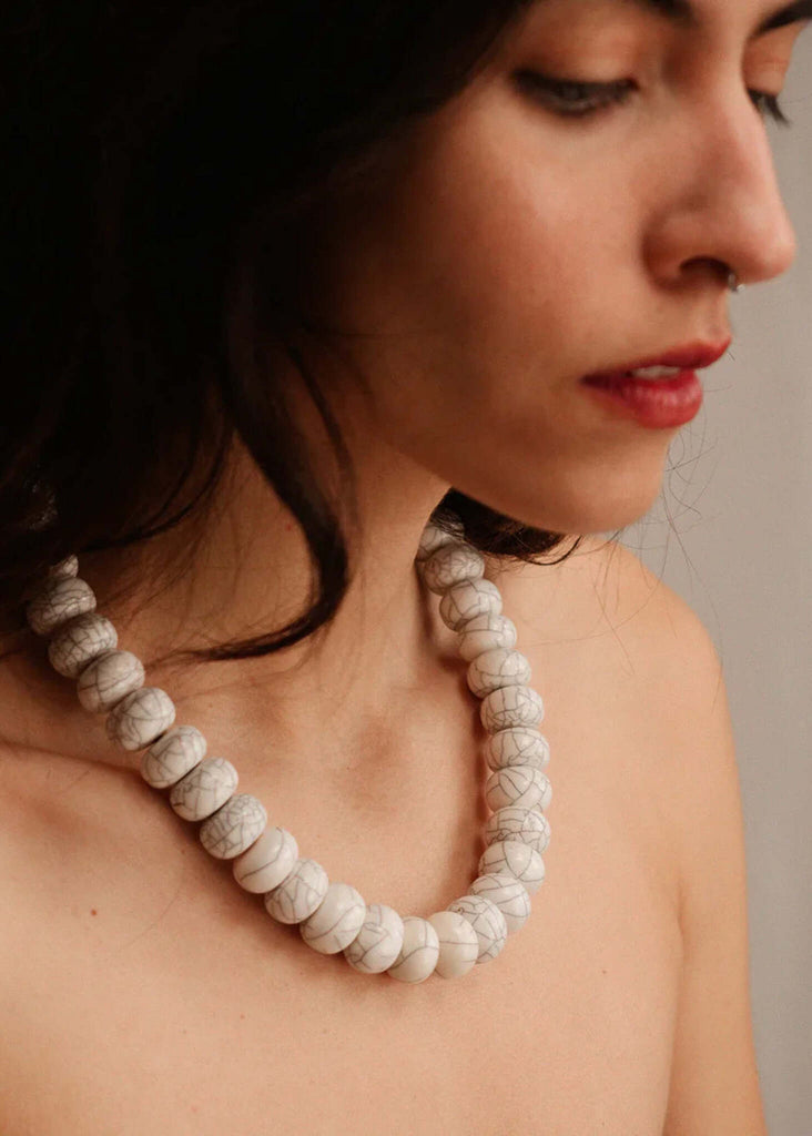 Woman wearing Sahara Necklace, white marble beaded design with barrel clasp — MYFASHIONFRUIT