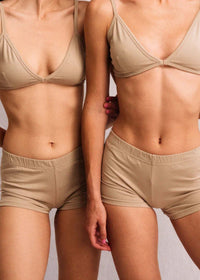 Two women wearing sand Fierce Shorties and matching bra top — MYFASHIONFRUIT