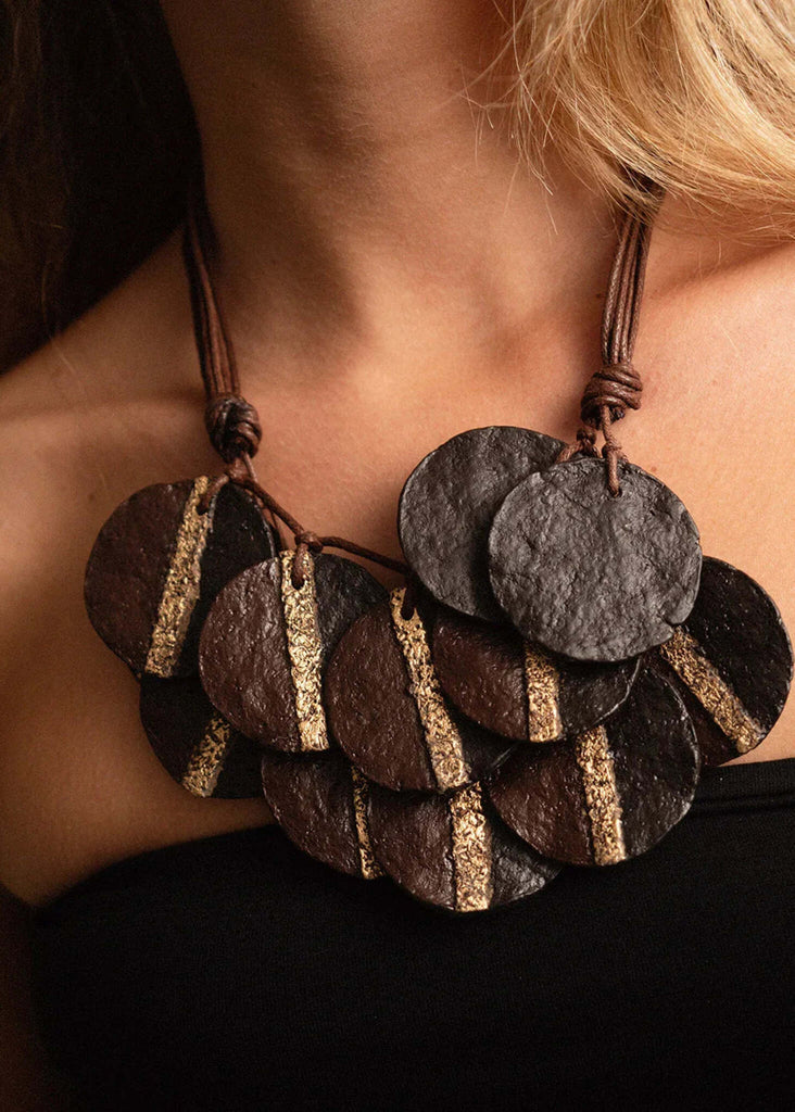 Woman wearing Jove Necklace — brown and black discs with gold stripe detail — MYFASHIONFRUIT