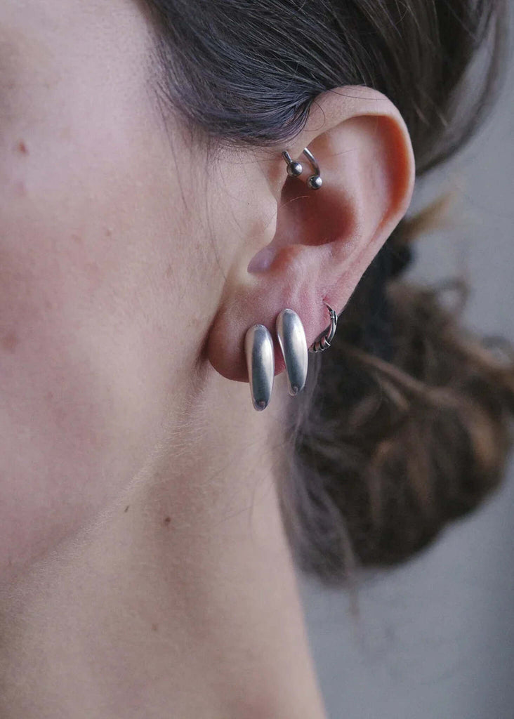 Hug Earrings — Silver on ear — MYFASHIONFRUIT