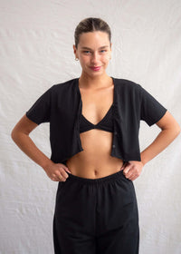 Woman wearing a black Yin Cardi with three buttons, and matching pants — MYFASHIONFRUIT