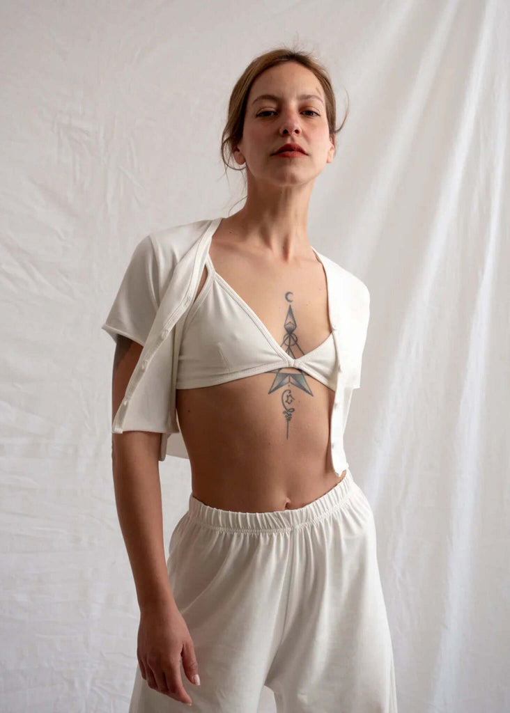 Woman wearing a white Yang Cardi, bra top and wide leg pants set — MYFASHIONFRUIT