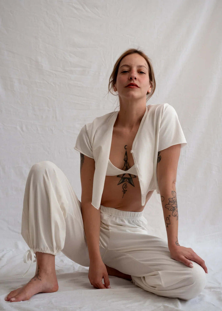 Woman wearing white Yang Pants and cropped top — MYFASHIONFRUIT