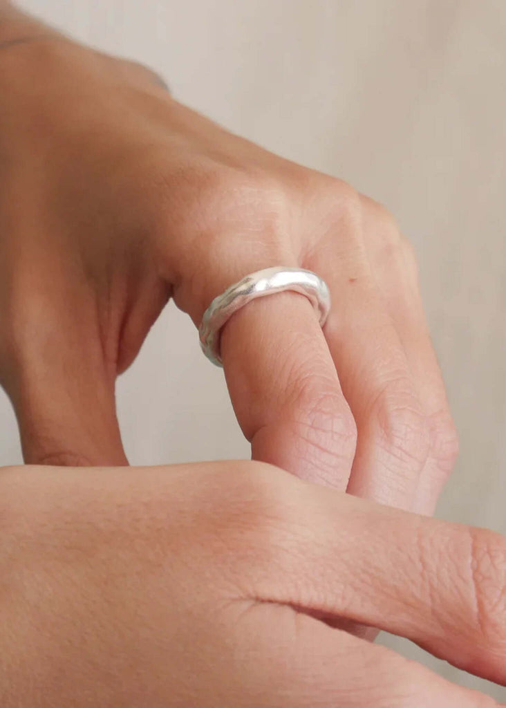 Cylindrical Ring — Silver ring on finger, detail — MYFASHIONFRUIT