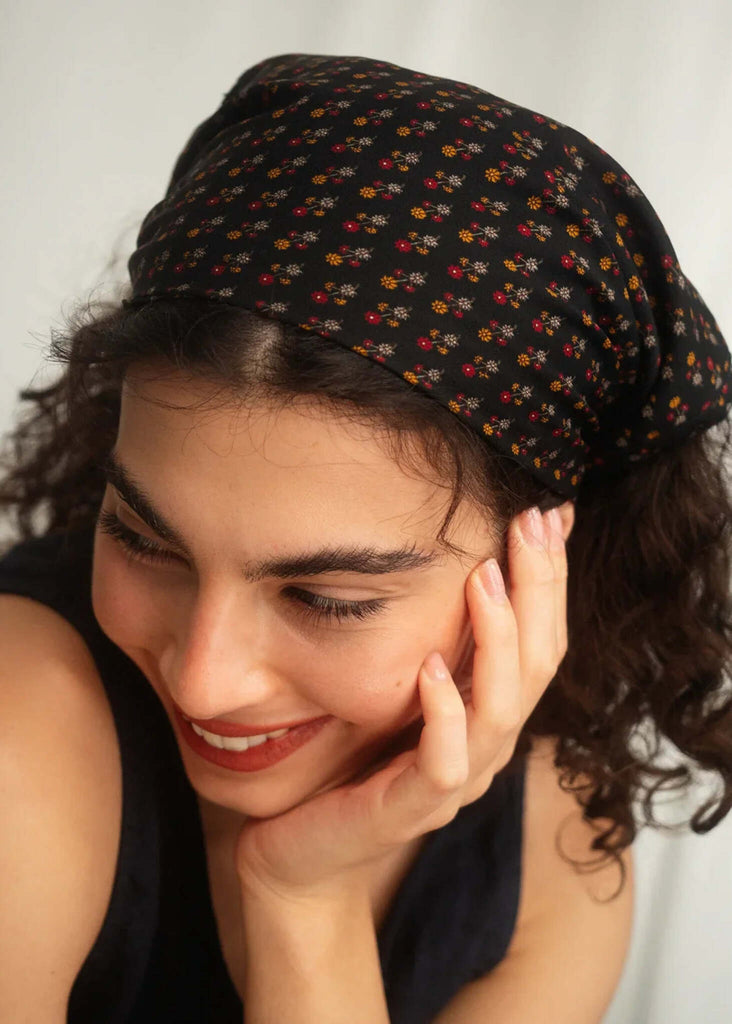 Woman wearing black Silk & Colorful Scarf with red and yellow floral print — MYFASHIONFRUIT