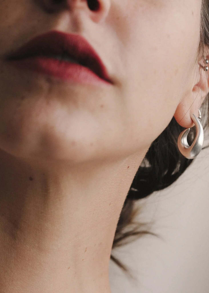 Bold Hook Earrings — Silver earrings on model, detail — MYFASHIONFRUIT