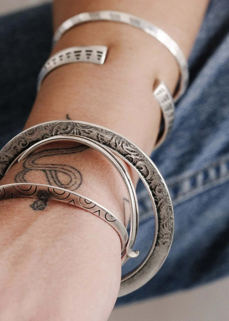 Loop Bracelet — Silver bracelets on arm, detail — MYFASHIONFRUIT