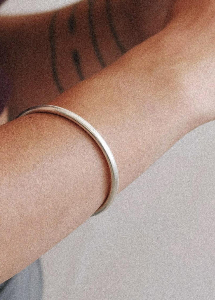 Kay Bracelet — Silver bangle on wrist — MYFASHIONFRUIT