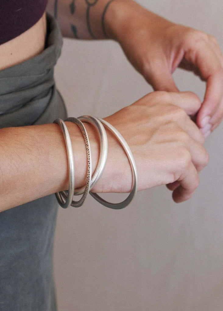 Kay Bracelet — Silver bangles on wrist — MYFASHIONFRUIT