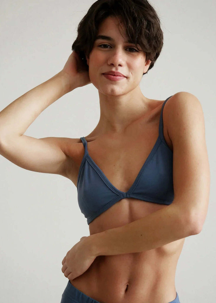 Woman wearing a Fierce Bralette in faded denim color — MYFASHIONFRUIT
