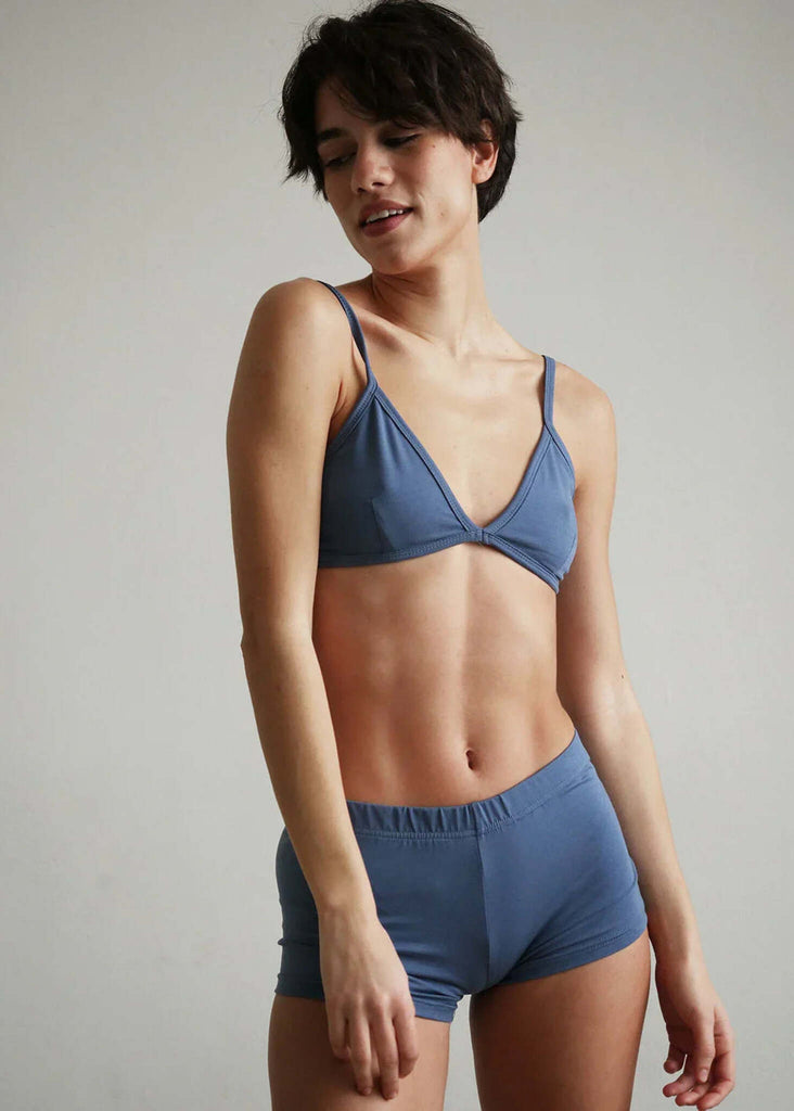 Woman wearing a Fierce Shorties set, faded denim blue cotton blend — MYFASHIONFRUIT