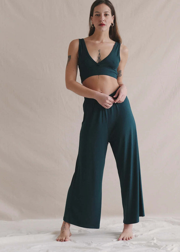 Woman wearing Tender Pants — green soft-touch high-rise pants with relaxed fit — MYFASHIONFRUIT