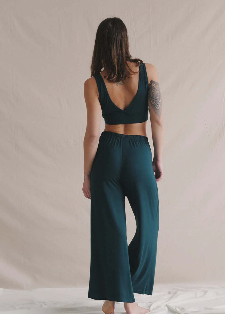 Woman wearing Tender Pants in green, loose fit — MYFASHIONFRUIT