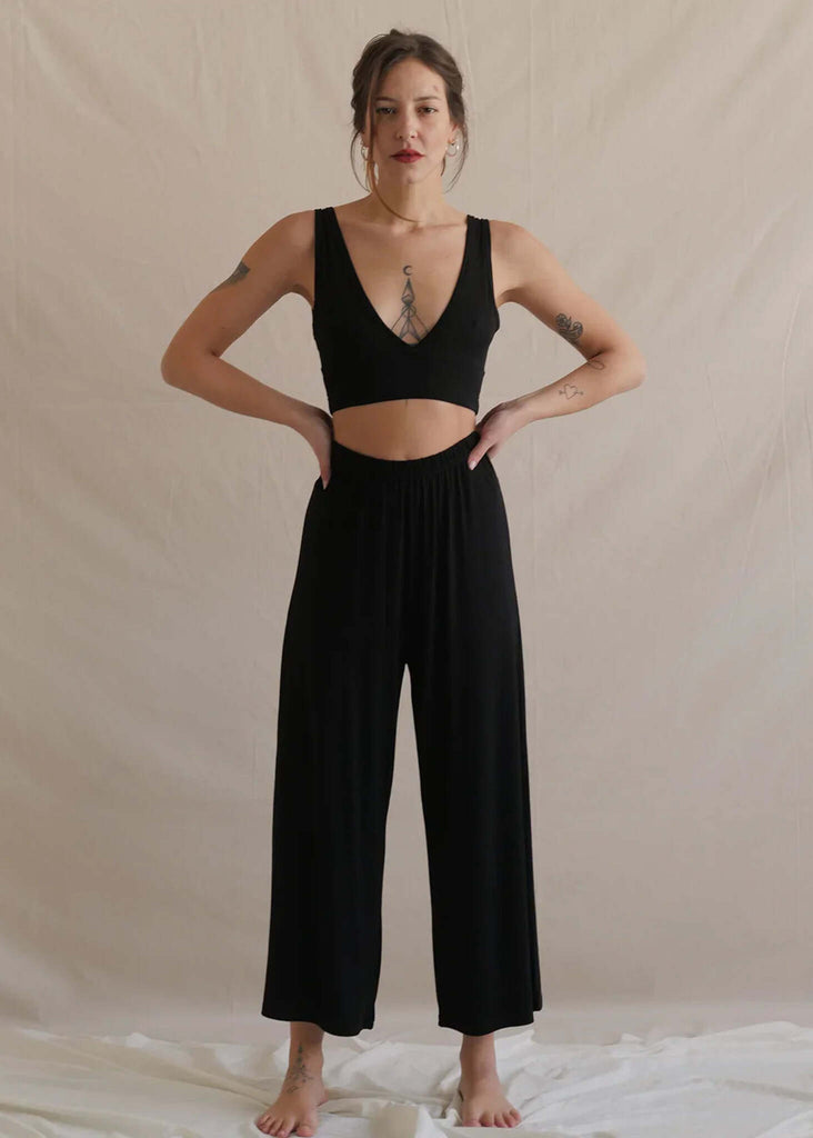 Woman wearing black Tender Pants and matching crop top — MYFASHIONFRUIT