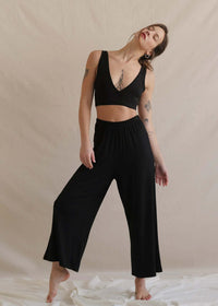 Woman wearing black Tender Pants and matching top — MYFASHIONFRUIT