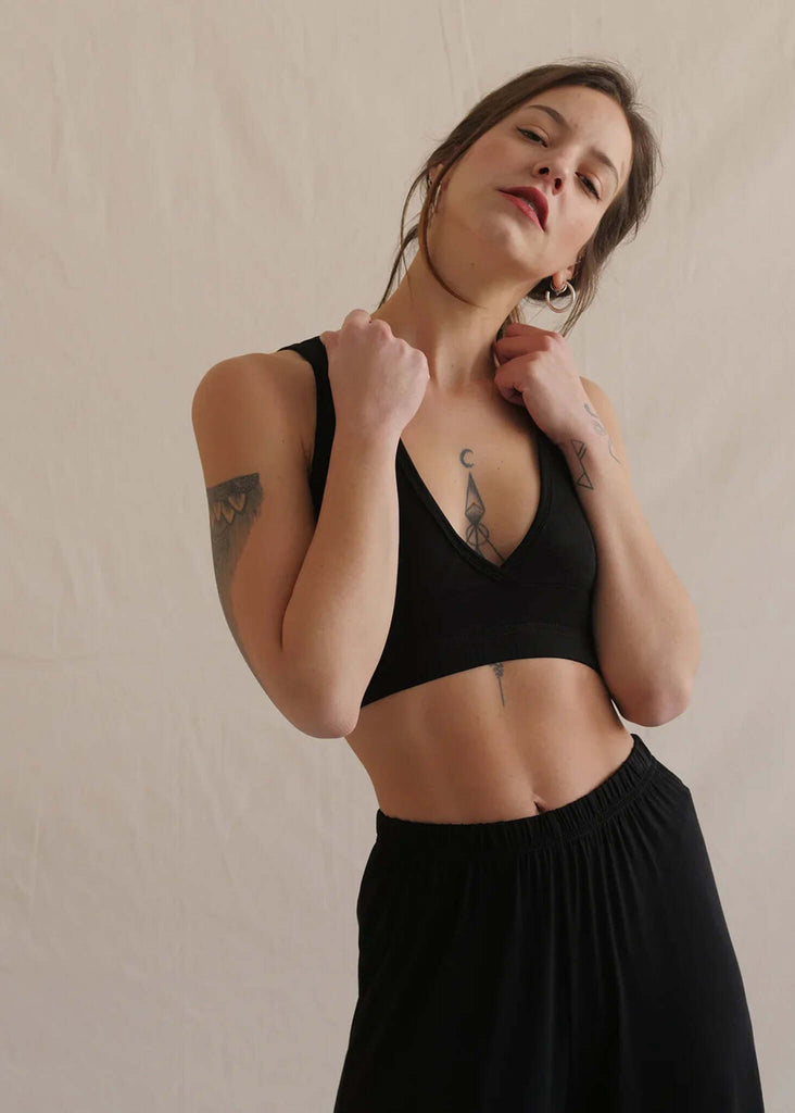 Woman wearing a black Soft Bralette and matching pants — MYFASHIONFRUIT