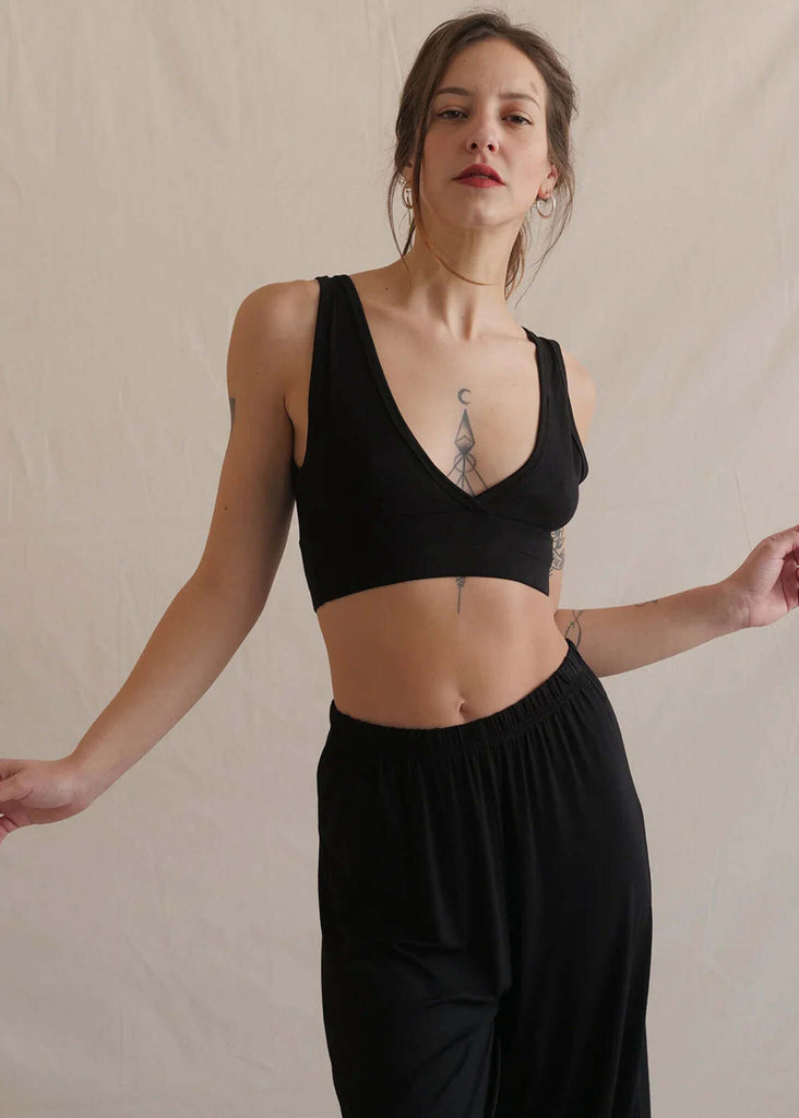 Woman wearing a black Soft Bralette and matching trousers — MYFASHIONFRUIT