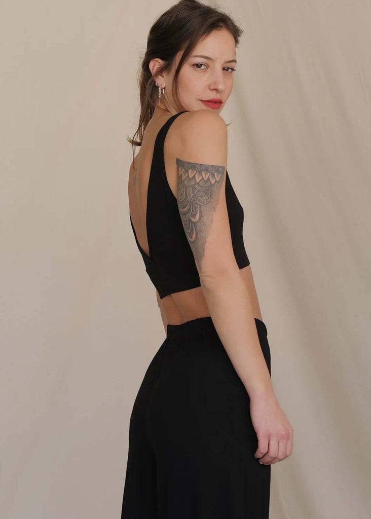 Woman wearing a black Soft Bralette and black pants — MYFASHIONFRUIT