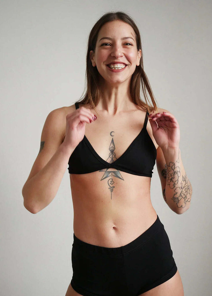 Woman wearing a black Fierce Bralette and matching shorts — MYFASHIONFRUIT