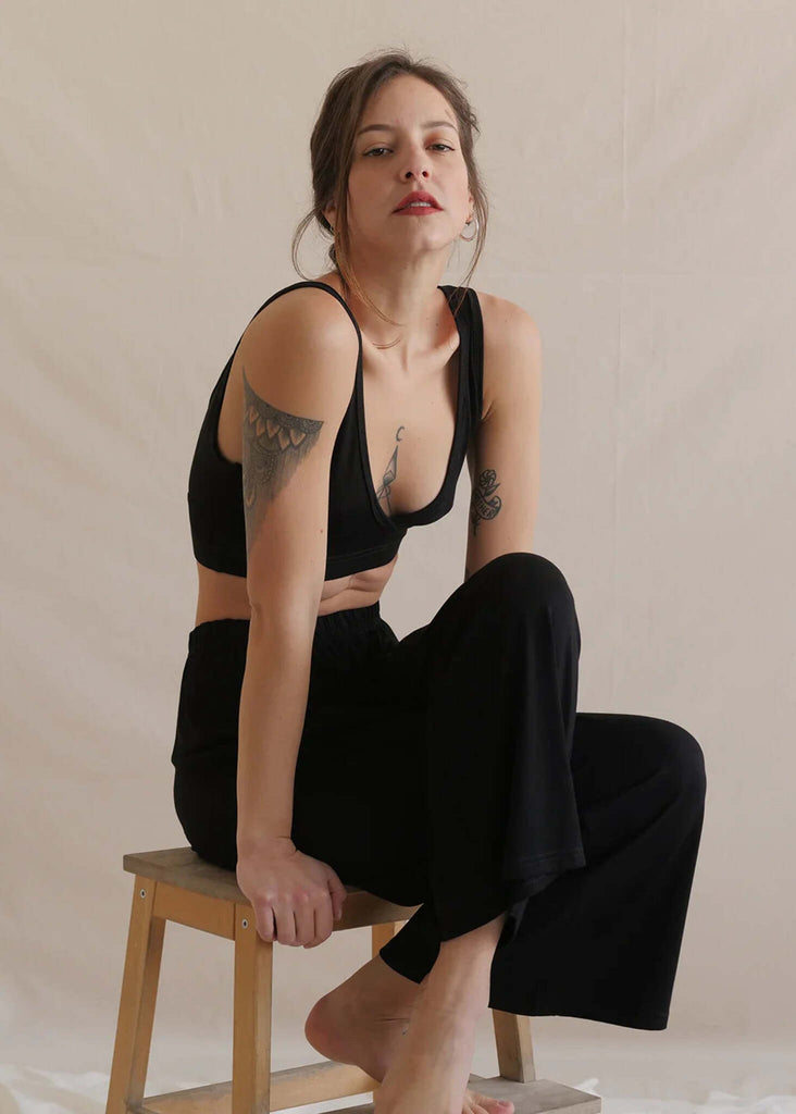 Woman wearing a black Soft Bralette and matching pants — MYFASHIONFRUIT