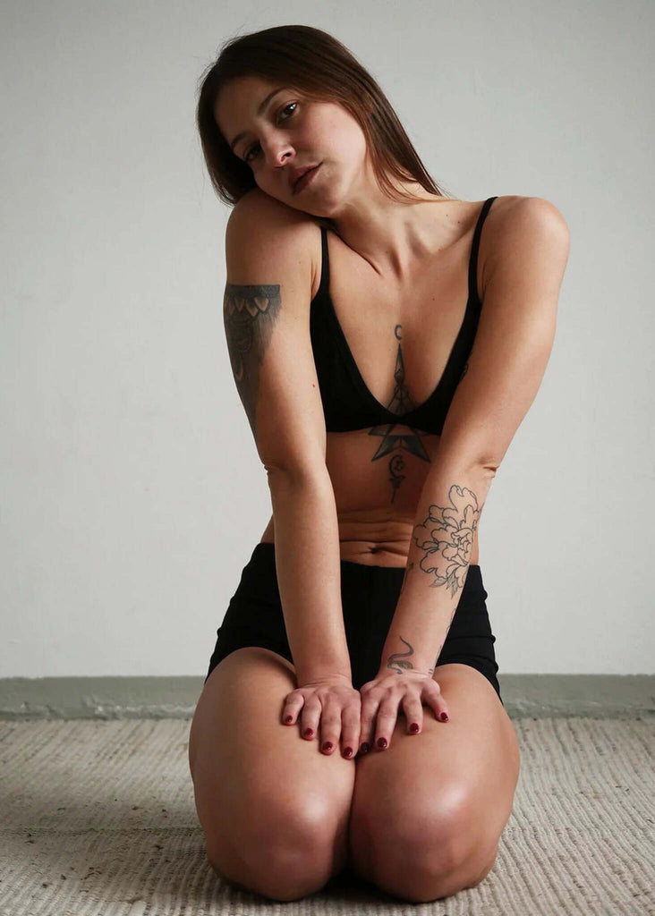 Woman wearing the black Fierce Bralette and matching shorts — MYFASHIONFRUIT